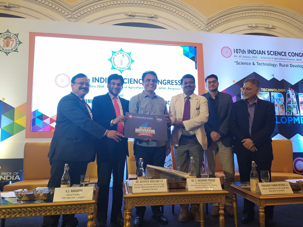 (Dr. C N Ashwath Narayanan, Deputy Chief Minister and Minister Higher Education, Medical Education and IT, BT and S&T, Government of Karnataka unveiling the logo of 107th Indian Science Congress)